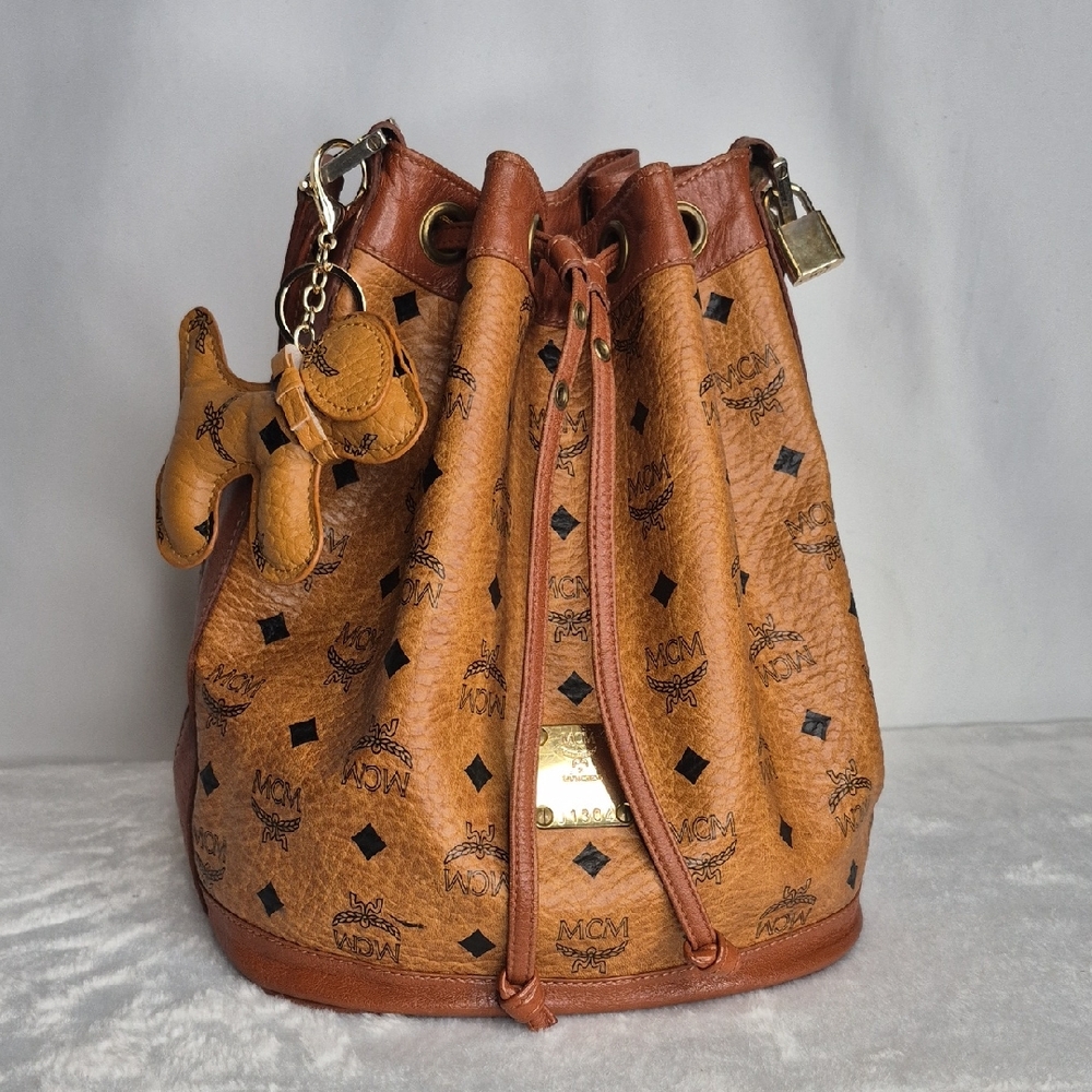 MCM Cognac Leather Drawstring Shoulder Crossbody Bucket Bag with Charm - Picture 3 of 17
